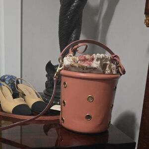 COACH Pink Bucket Bag with Floral Accent